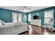 Bright bedroom with a ceiling fan and access to the outside at 303 Ayrie Ct., Conway, SC 29527