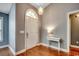 Inviting entryway features hardwood floors and an arched front door at 303 Ayrie Ct., Conway, SC 29527