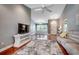 Open-concept living area featuring hardwood floors, vaulted ceilings and natural light at 303 Ayrie Ct., Conway, SC 29527