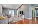Spacious living room featuring hardwood floors, vaulted ceilings and neutral walls at 303 Ayrie Ct., Conway, SC 29527