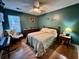 Comfortable bedroom with hardwood floors and soft lighting at 3048 Dewberry Dr., Conway, SC 29527