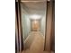 View of finished basement hallway, featuring paneled accent wall, painted walls and modern ceiling light at 3048 Dewberry Dr., Conway, SC 29527