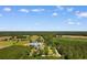 Overhead view of property including home and outbuilding in wooded setting at 308 Old Stage Rd at 308 Old Stage Rd., Mullins, SC 29574