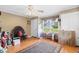 Sunny bedroom featuring hardwood floors, natural light, and ample space at 308 Old Stage Rd., Mullins, SC 29574