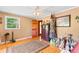 Bright bedroom with wooden floors and a window showcasing the outdoor view at 308 Old Stage Rd., Mullins, SC 29574