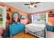 Bright bedroom featuring a blue painted dresser and white linens at 308 Old Stage Rd., Mullins, SC 29574