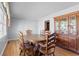Traditional dining room featuring wood floors, classic furniture, and a beautiful china cabinet at 308 Old Stage Rd., Mullins, SC 29574