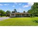 Charming single-story home with a spacious front yard and inviting front porch at 308 Old Stage Rd., Mullins, SC 29574