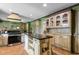 Gourmet kitchen featuring a large island, custom cabinets, and modern appliances at 308 Old Stage Rd., Mullins, SC 29574