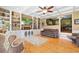 Open living room with hardwood floors, coffered ceilings, and built-in cabinets, perfect for entertaining at 308 Old Stage Rd., Mullins, SC 29574
