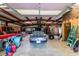 Large outbuilding interior with vehicles, tools, and ample storage space at 308 Old Stage Rd., Mullins, SC 29574