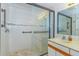 Bathroom with glass shower doors, tile flooring, grab bars and vanity at 311 69Th Ave. N # 302, Myrtle Beach, SC 29572