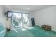 Bright living room with large sliding doors opening to an outdoor balcony at 311 69Th Ave. N # 302, Myrtle Beach, SC 29572