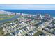Expansive aerial view showcasing waterfront homes and canals near the ocean at 312 35Th Ave. N, North Myrtle Beach, SC 29582