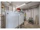 Basement laundry area features washer, dryer and water heater at 312 35Th Ave. N, North Myrtle Beach, SC 29582