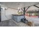 Outdoor hot tub on a patio with string lights and outdoor entertainment space at 312 35Th Ave. N, North Myrtle Beach, SC 29582