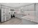 Modern kitchen with granite countertops and stainless steel appliances at 312 35Th Ave. N, North Myrtle Beach, SC 29582