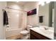 Bright bathroom featuring a shower-tub combo, toilet, and vanity with sink at 318 Castle Dr. # 1443, Myrtle Beach, SC 29579