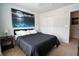 Bedroom featuring carpet flooring, closet, and a large window at 318 Castle Dr. # 1443, Myrtle Beach, SC 29579