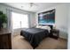 Comfortable bedroom with large window, ceiling fan, and carpet flooring at 318 Castle Dr. # 1443, Myrtle Beach, SC 29579