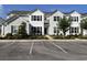 Charming two-story condo with manicured landscaping and ample parking at 318 Castle Dr. # 1443, Myrtle Beach, SC 29579