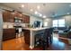 Open kitchen with stainless appliances, a center island, and hardwood floors at 318 Castle Dr. # 1443, Myrtle Beach, SC 29579