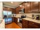 Well-equipped kitchen featuring stainless steel appliances and granite countertops at 318 Castle Dr. # 1443, Myrtle Beach, SC 29579