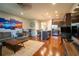 Spacious living area with hardwood floors, modern decor, and open floor plan to kitchen at 318 Castle Dr. # 1443, Myrtle Beach, SC 29579