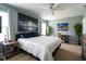 Cozy bedroom featuring a spacious layout, a ceiling fan, and modern decor at 318 Castle Dr. # 1443, Myrtle Beach, SC 29579