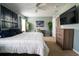 Serene bedroom with ample space, natural light, and a ceiling fan at 318 Castle Dr. # 1443, Myrtle Beach, SC 29579