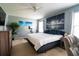 Bright bedroom with a large bed, ceiling fan, and neutral colors at 318 Castle Dr. # 1443, Myrtle Beach, SC 29579