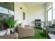 Relaxing screened porch with comfortable chairs and outdoor grill at 318 Castle Dr. # 1443, Myrtle Beach, SC 29579