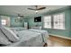 Comfortable bedroom featuring two beds, a ceiling fan, and coastal decor at 321 53Rd Ave. N, North Myrtle Beach, SC 29582
