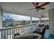 Beautiful covered deck features comfortable seating and peaceful waterfront views at 321 53Rd Ave. N, North Myrtle Beach, SC 29582