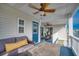 Relaxing covered deck with comfortable furniture and views of the waterfront at 321 53Rd Ave. N, North Myrtle Beach, SC 29582