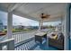 Inviting covered deck with outdoor seating and scenic water views at 321 53Rd Ave. N, North Myrtle Beach, SC 29582