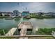 Beautiful waterfront view of canal-front homes with private docks at 321 53Rd Ave. N, North Myrtle Beach, SC 29582