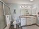 Well-lit bathroom featuring a granite countertop vanity and shower/tub combo at 323 Wendover Ct. # 10-A, Myrtle Beach, SC 29572