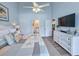 Vaulted bedroom with TV, dresser, and ensuite bathroom at 323 Wendover Ct. # 10-A, Myrtle Beach, SC 29572