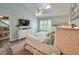 Cozy bedroom with ample natural light, neutral tones, and wood-look floors at 323 Wendover Ct. # 10-A, Myrtle Beach, SC 29572