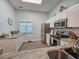 Clean, well-lit kitchen with stainless steel appliances and granite countertops at 323 Wendover Ct. # 10-A, Myrtle Beach, SC 29572