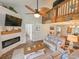 Bright living room with a modern fireplace, TV, and coastal decor at 323 Wendover Ct. # 10-A, Myrtle Beach, SC 29572