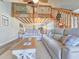 Inviting living space with comfortable seating and a nautical-themed loft at 323 Wendover Ct. # 10-A, Myrtle Beach, SC 29572