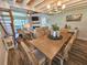 Open-concept living area with fireplace, comfortable seating, and bright, natural light at 323 Wendover Ct. # 10-A, Myrtle Beach, SC 29572