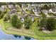 Aerial view of a home in a residential neighborhood surrounded by lush landscaping at 341 Bahama Dr., Murrells Inlet, SC 29576