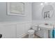 Clean bathroom with wainscoting, and a window with blinds at 341 Bahama Dr., Murrells Inlet, SC 29576