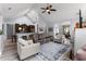Spacious living room with vaulted ceilings, hardwood floors, and open layout to the kitchen at 341 Bahama Dr., Murrells Inlet, SC 29576