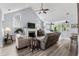 Bright and airy living room with vaulted ceilings, fireplace, and hardwood floors at 341 Bahama Dr., Murrells Inlet, SC 29576