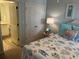 Bedroom offers a queen bed, coastal accents, and an en-suite bathroom for added convenience at 371 S Dunes Dr., Pawleys Island, SC 29585