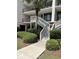 The beautiful stairs, landscaping and entryway provide an inviting exterior appeal to the building at 371 S Dunes Dr., Pawleys Island, SC 29585